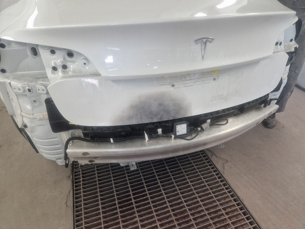 White Tesla Bodywork Repair
